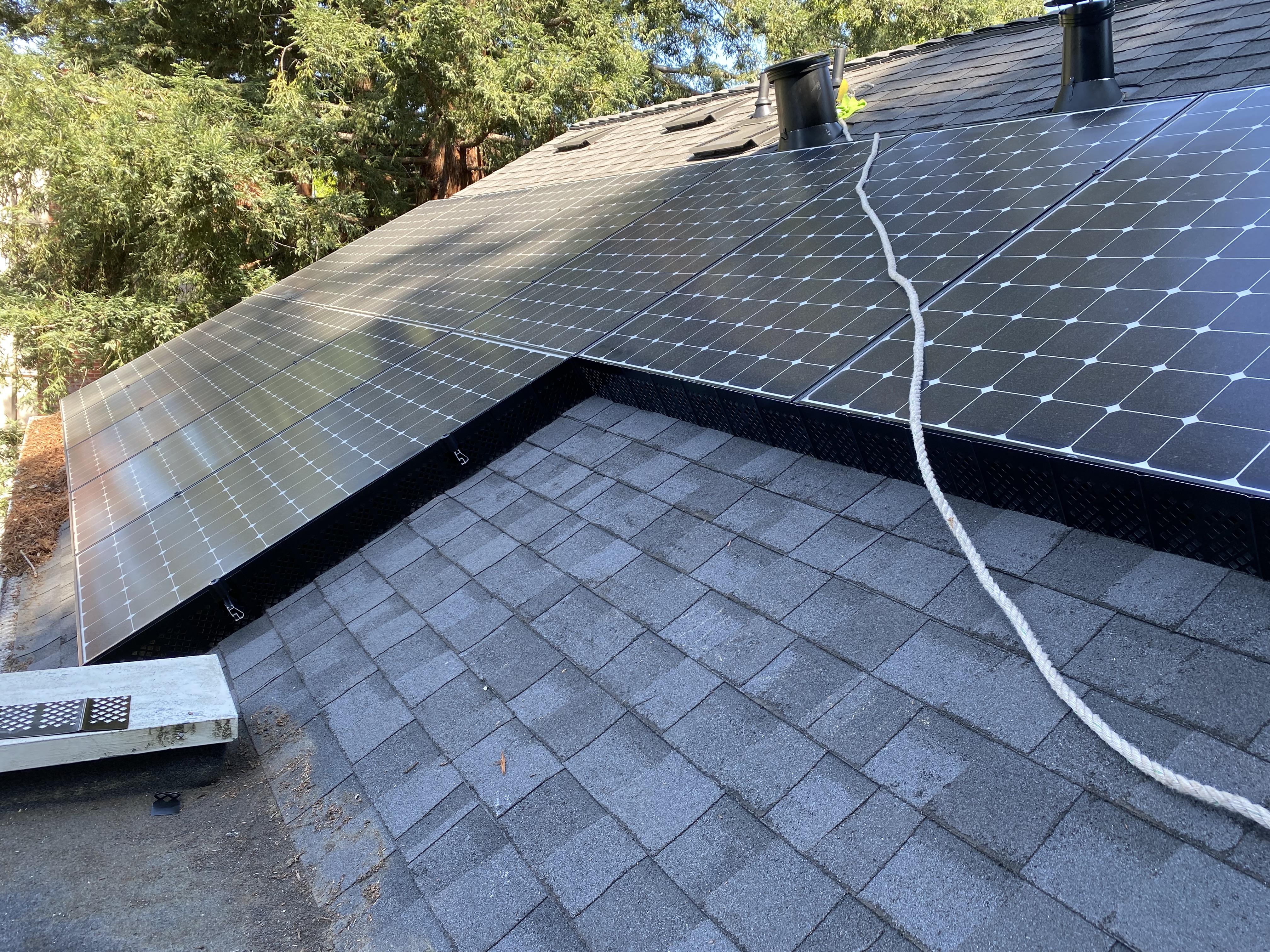 Solar panel bird and animal proofing in Palo Alto CA — protective mesh installation under solar panels by Bull Run Exterior Wash LLC