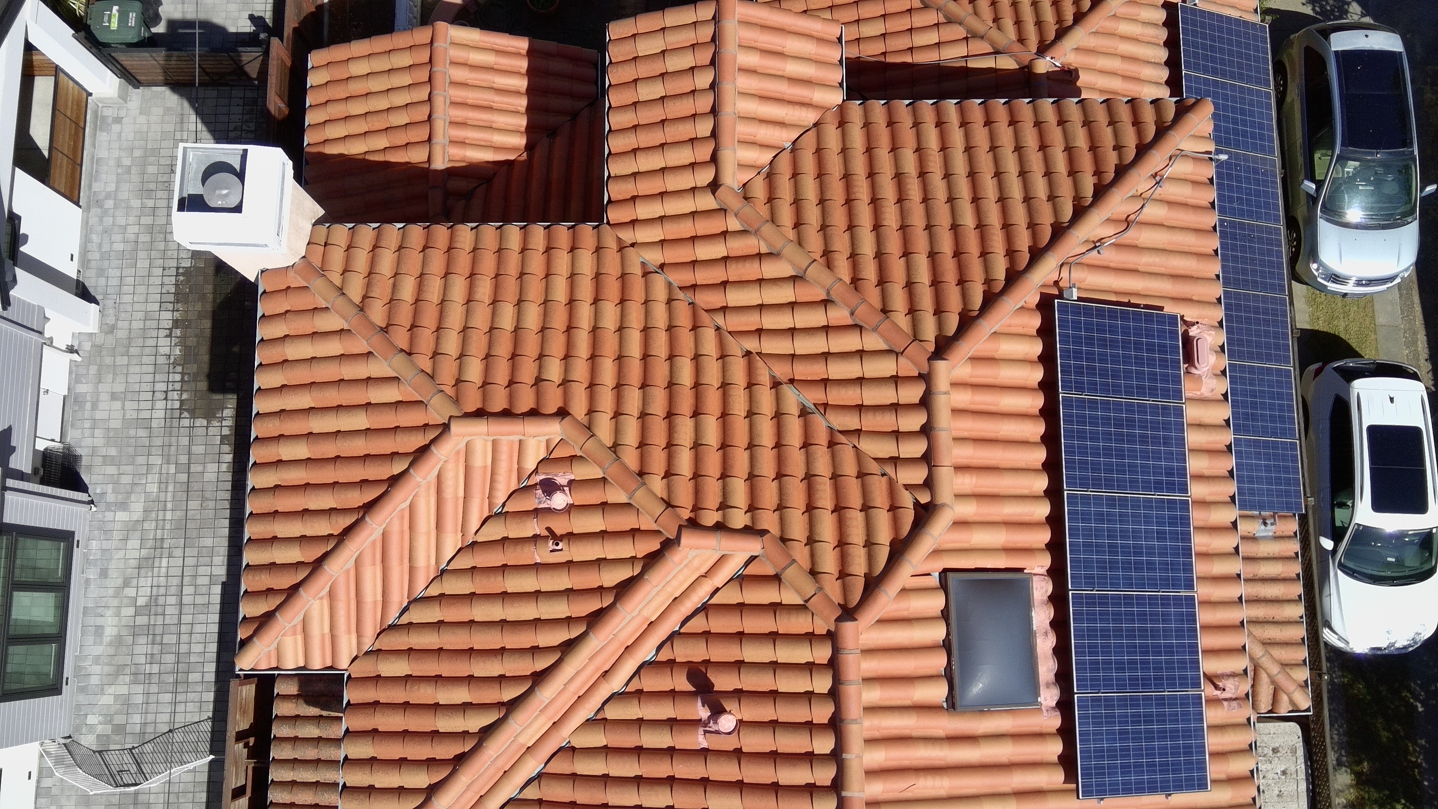 After — Burlingame tile roof section clean after soft wash service