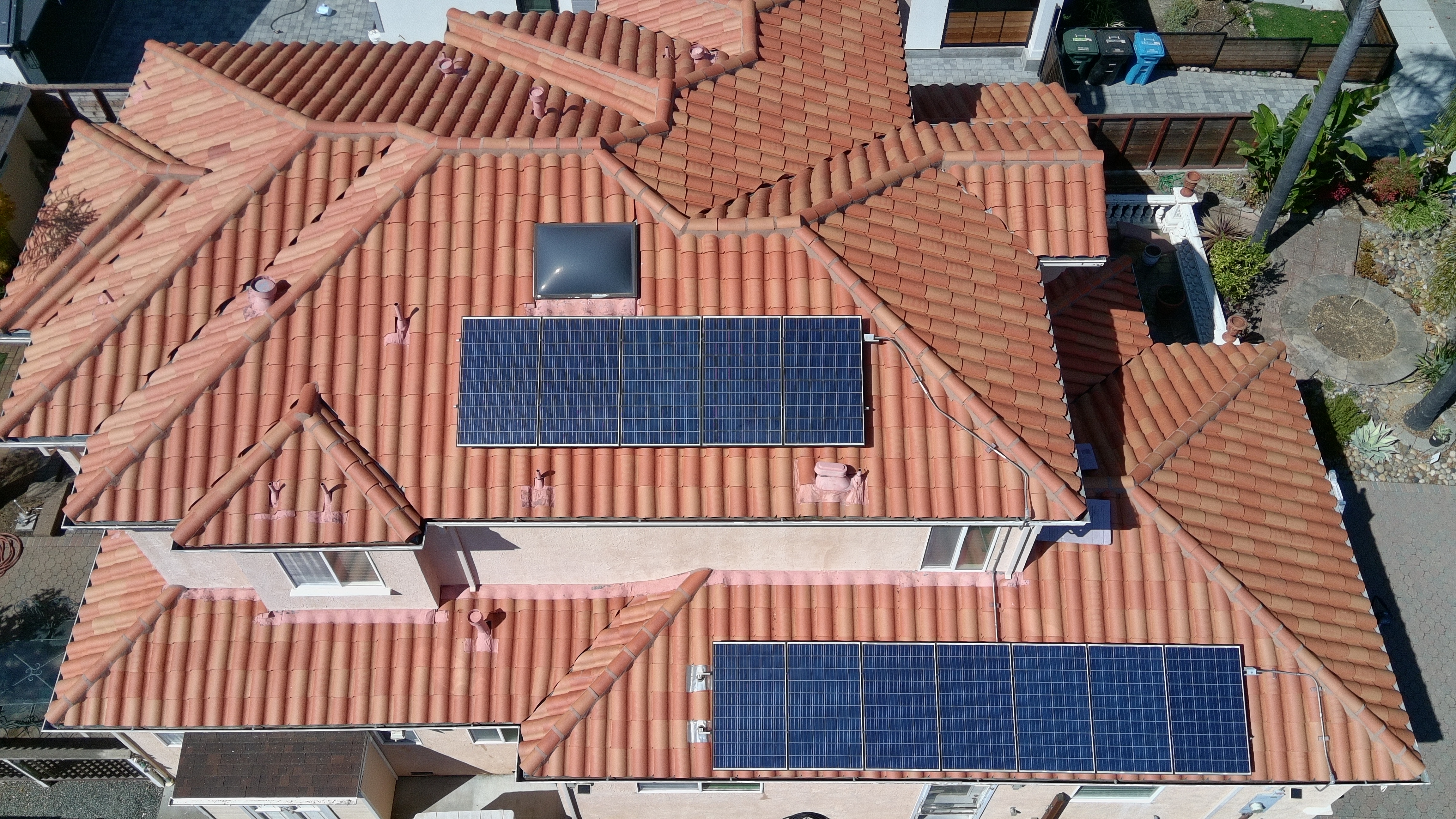 After — Burlingame Spanish tile roof restored, original terracotta color visible