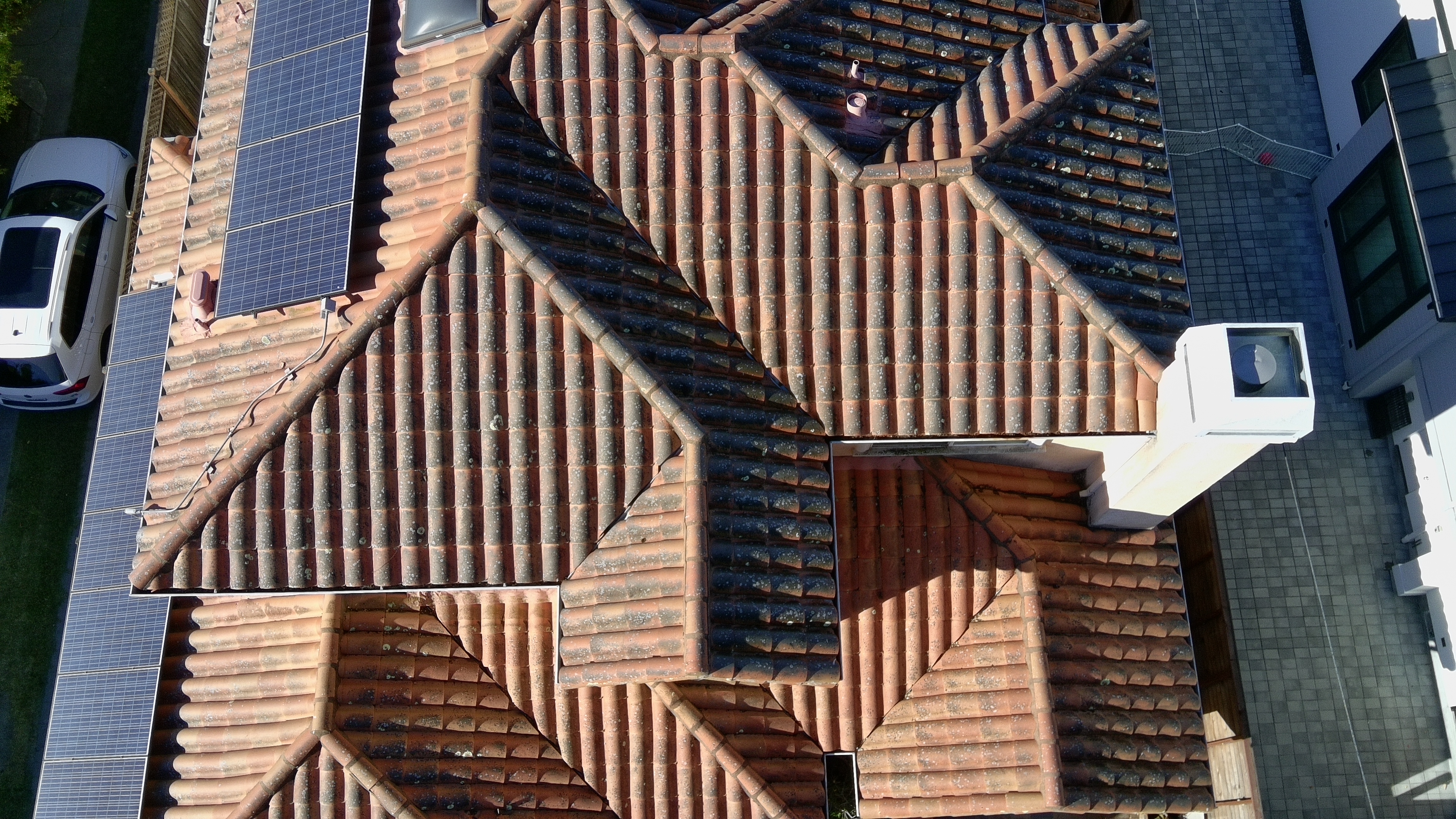 Before — Burlingame tile roof with algae streaks and biological staining