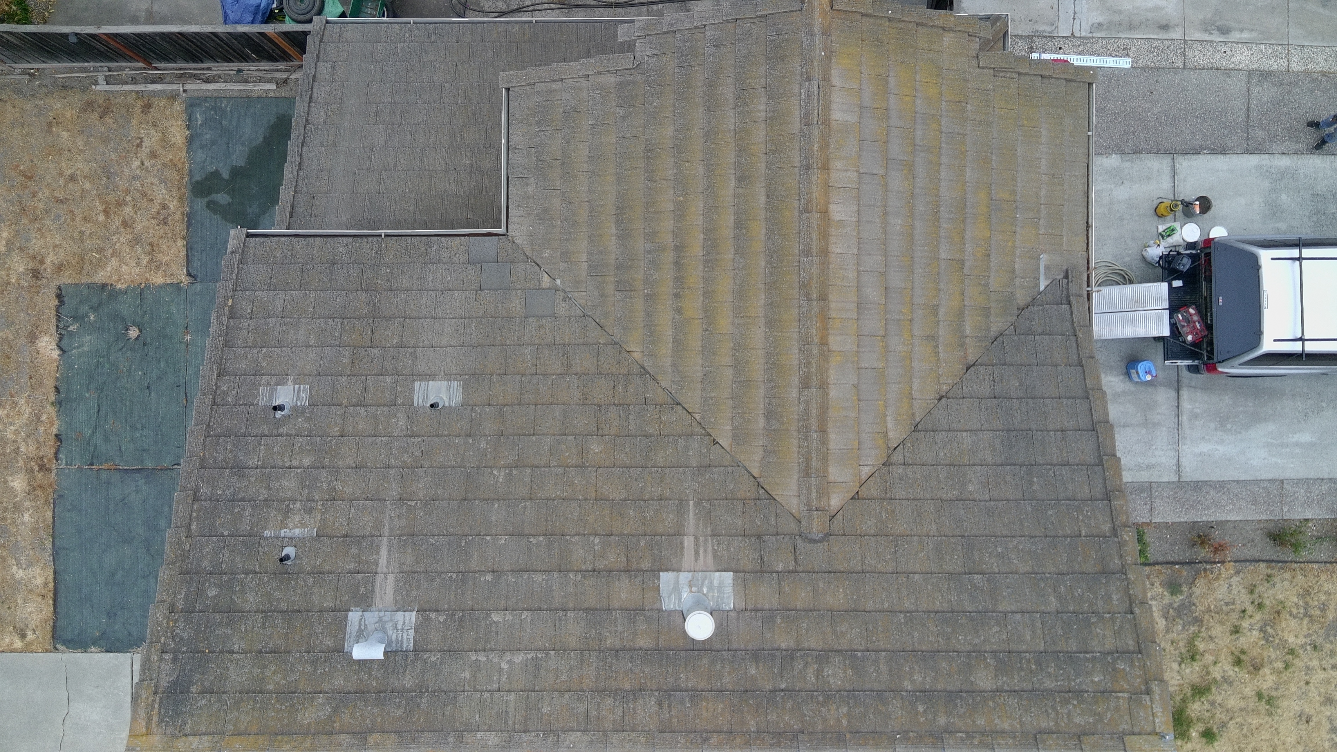 Before — Fremont flat tile roof with heavy biological growth
