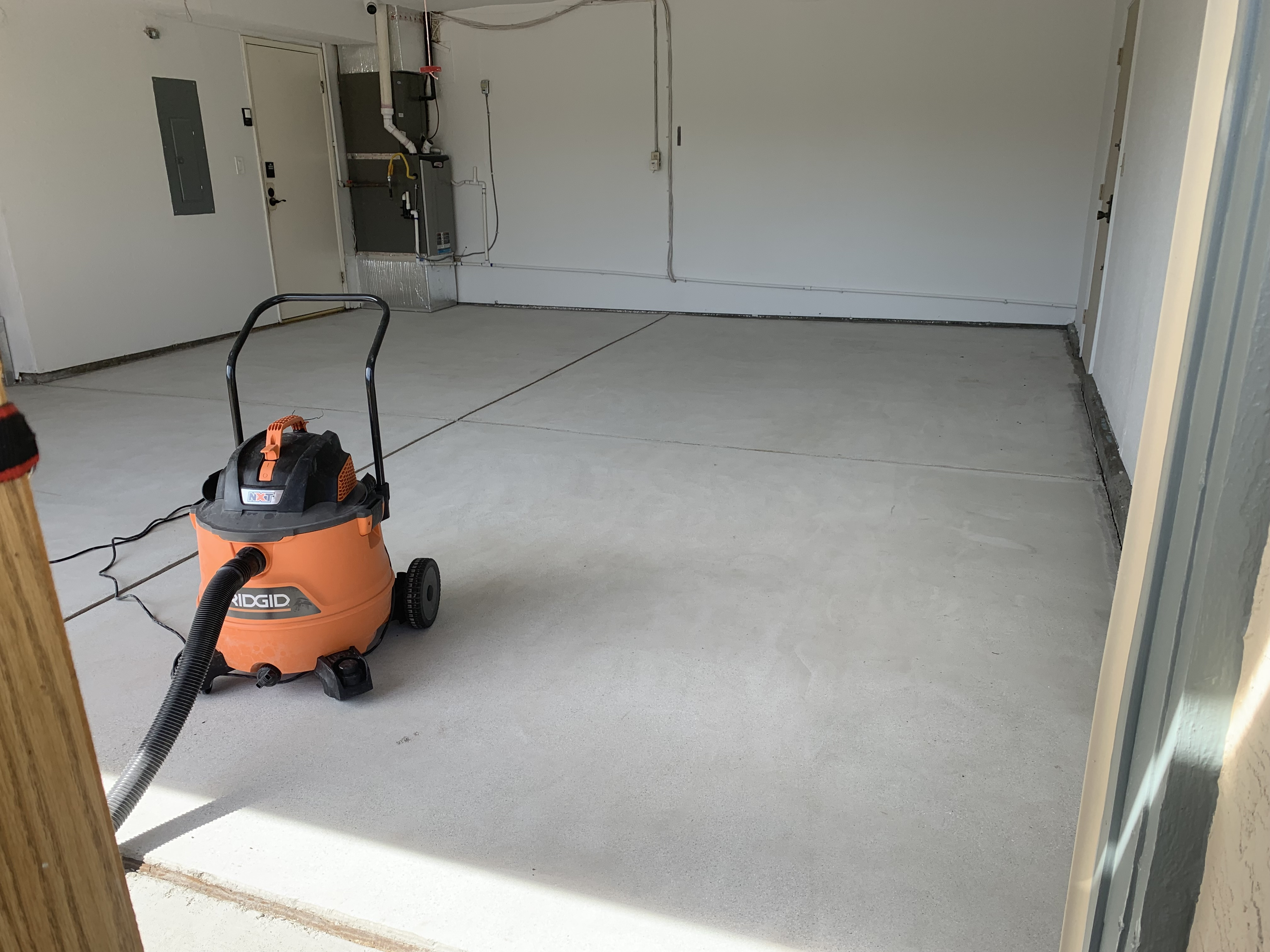 Before — Fremont garage concrete before surface prep and epoxy coating