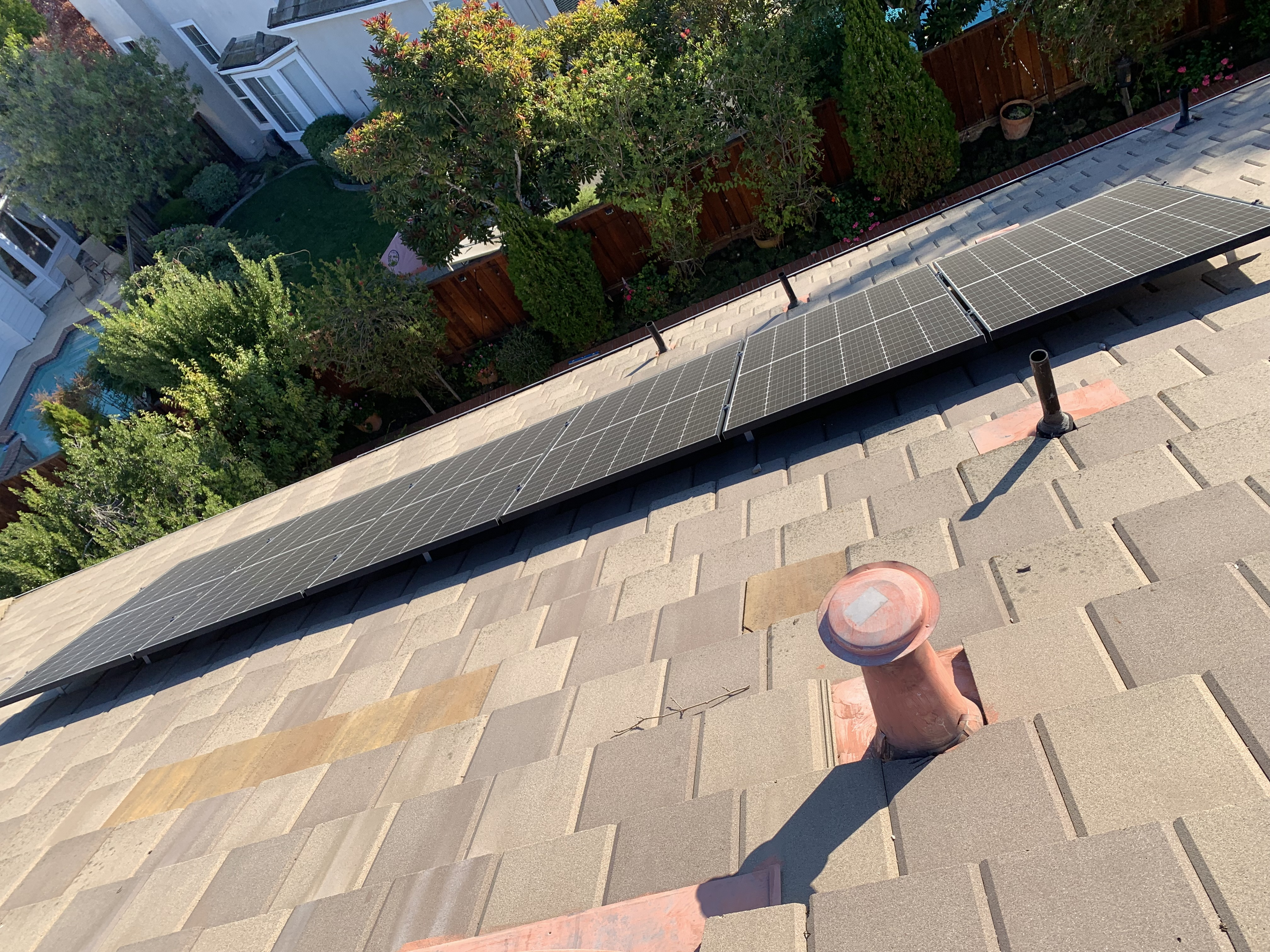 Before — Livermore solar panel row with bird dropping stains before cleaning