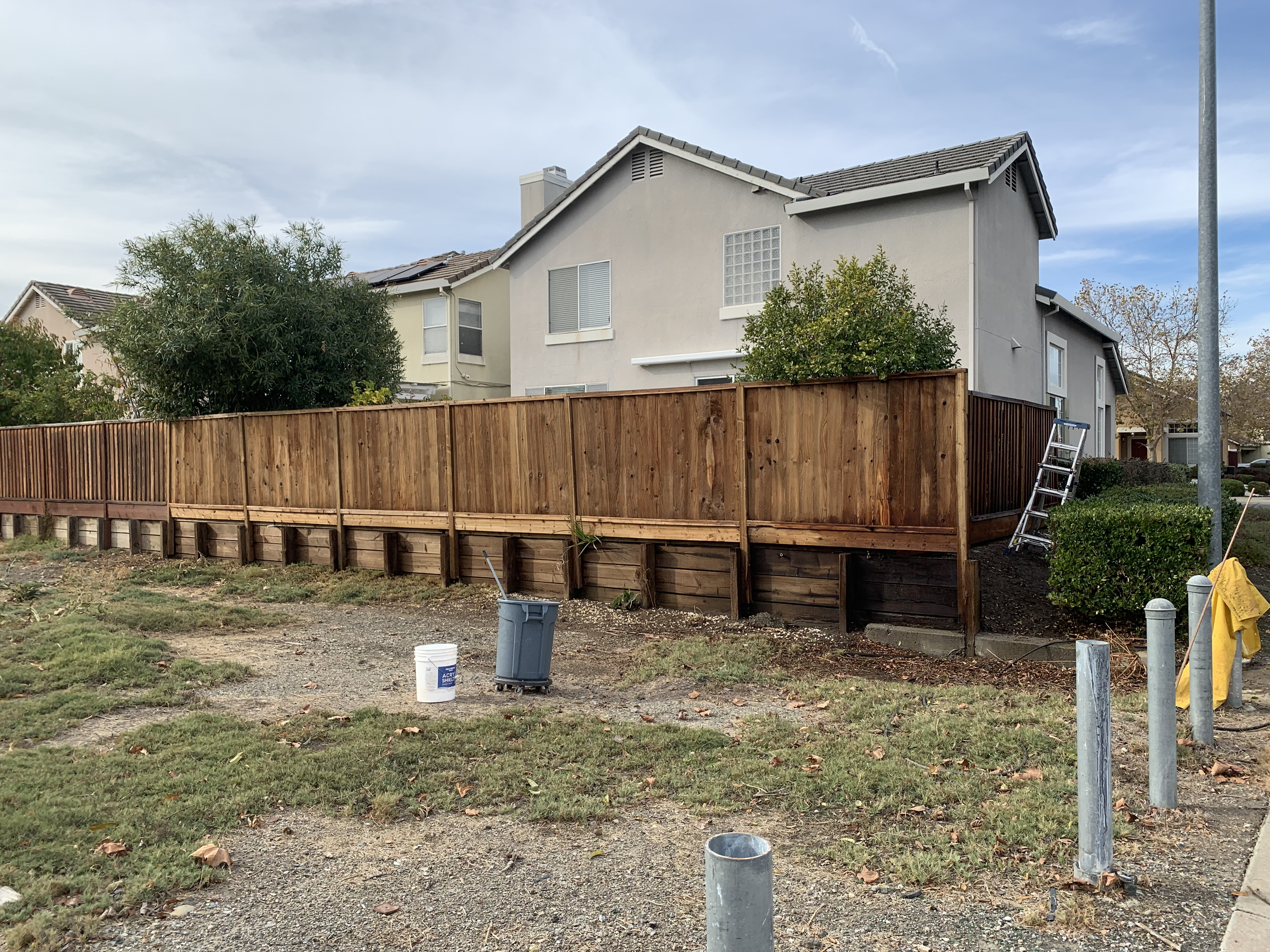 After cleaning — Milpitas fence boards cleaned, grey oxidation removed
