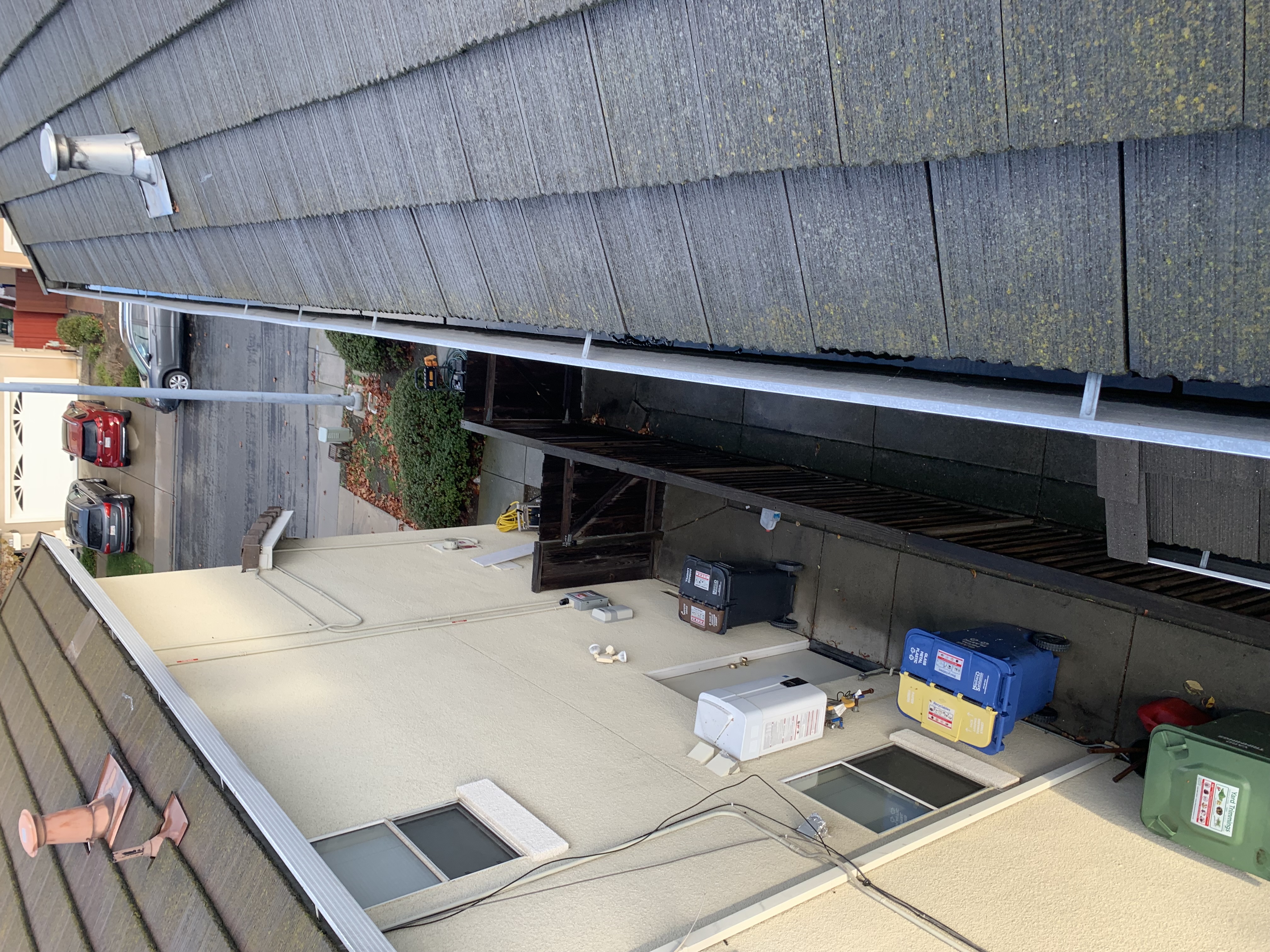 Before — Milpitas roof tile streaking from algae and lichen