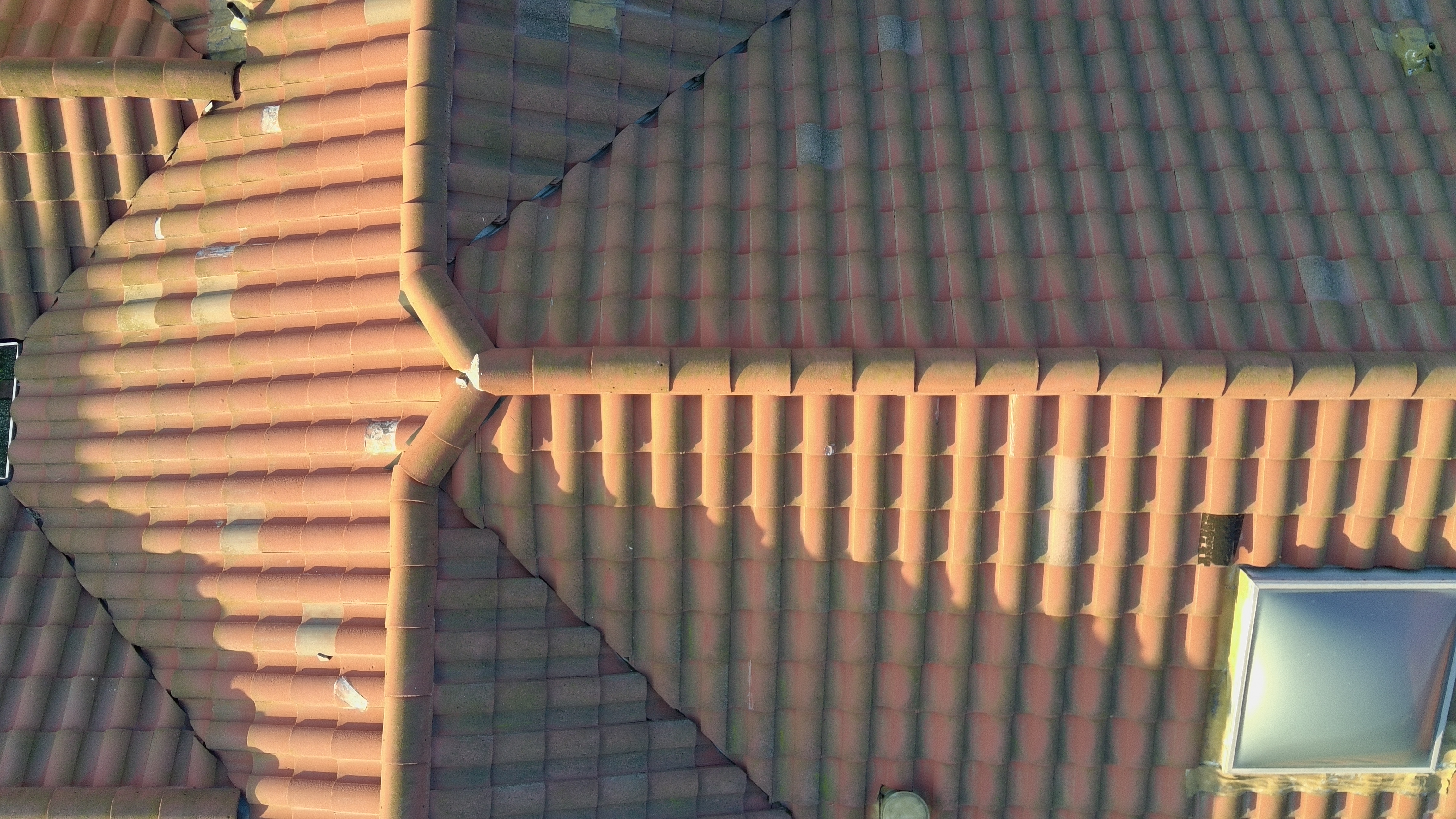 Before — Milpitas townhouse S-tile roof ridge with moss growth