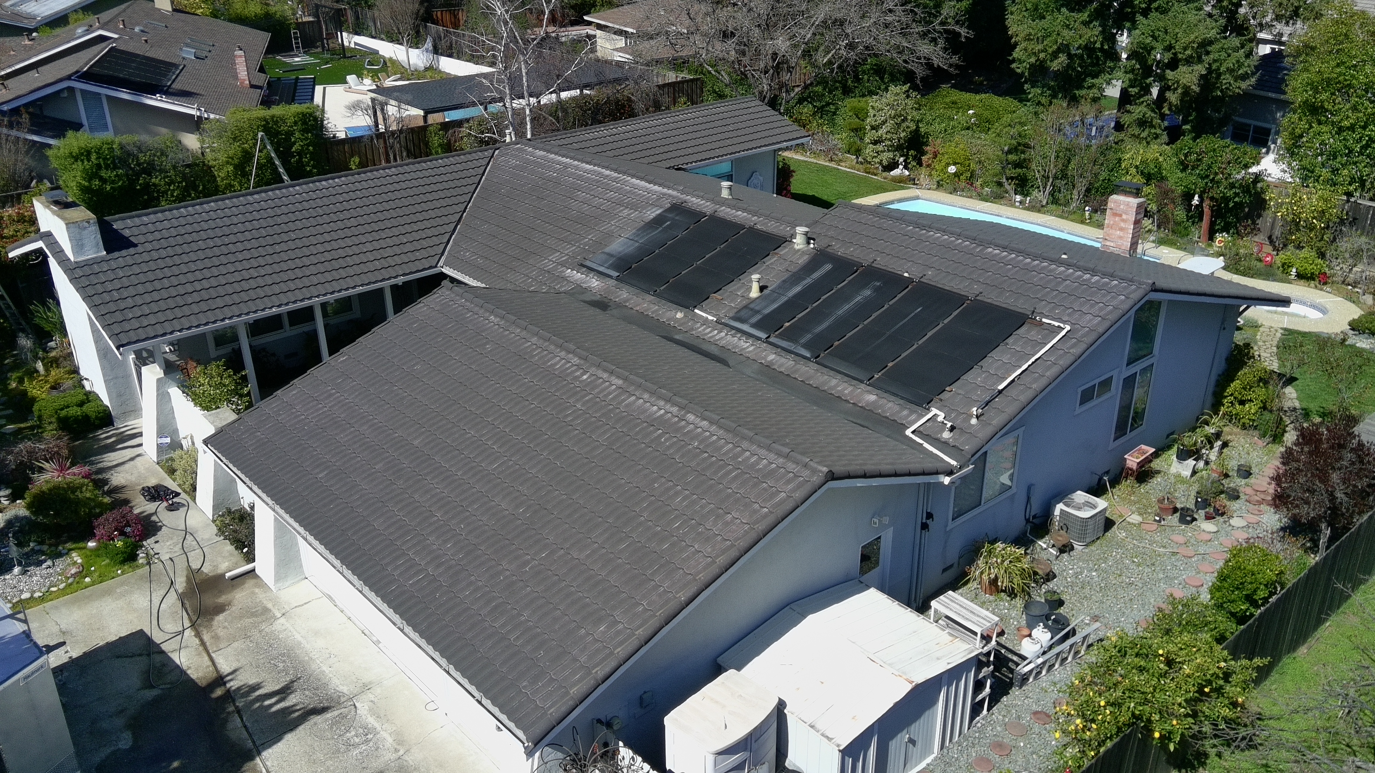 After — Wide view Monte Sereno roof fully cleaned, job complete