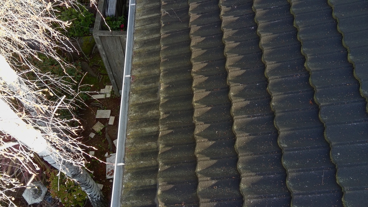 Before — Monte Sereno roof with heavy moss and lichen buildup