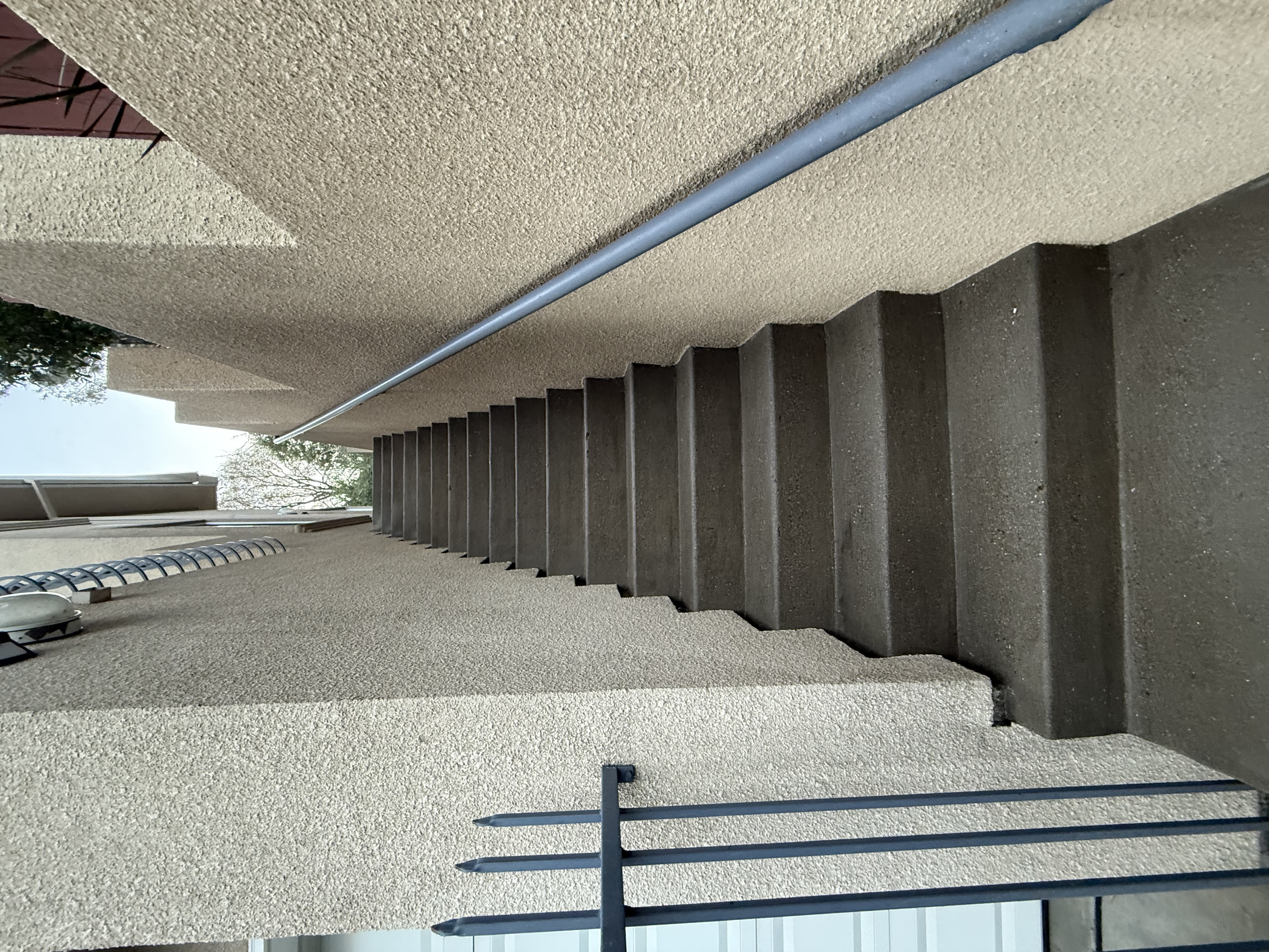 After — Oakland Hills siding and trim clean, original color restored