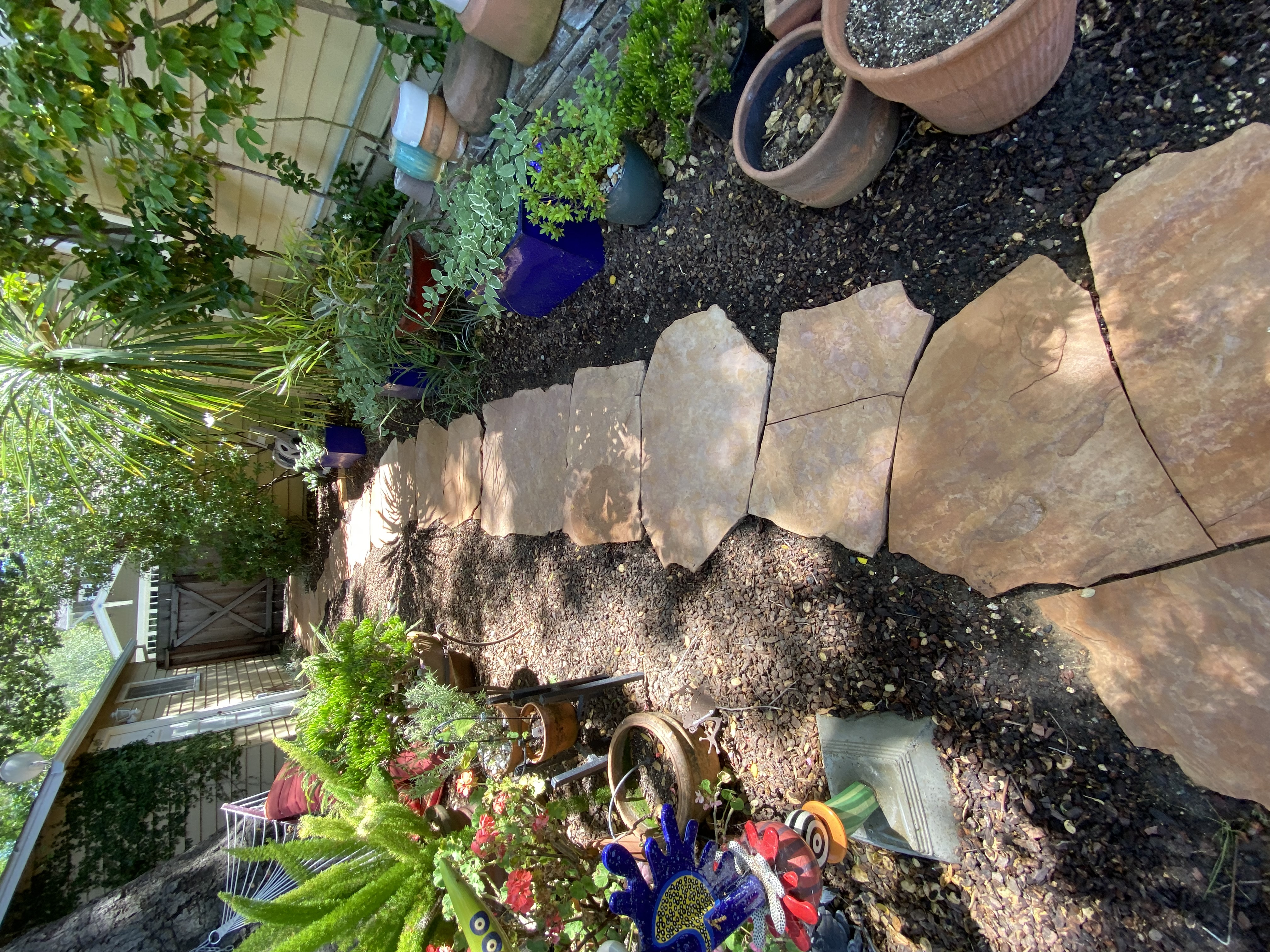 After — Palo Alto flagstone patio complete, stone color and texture clear