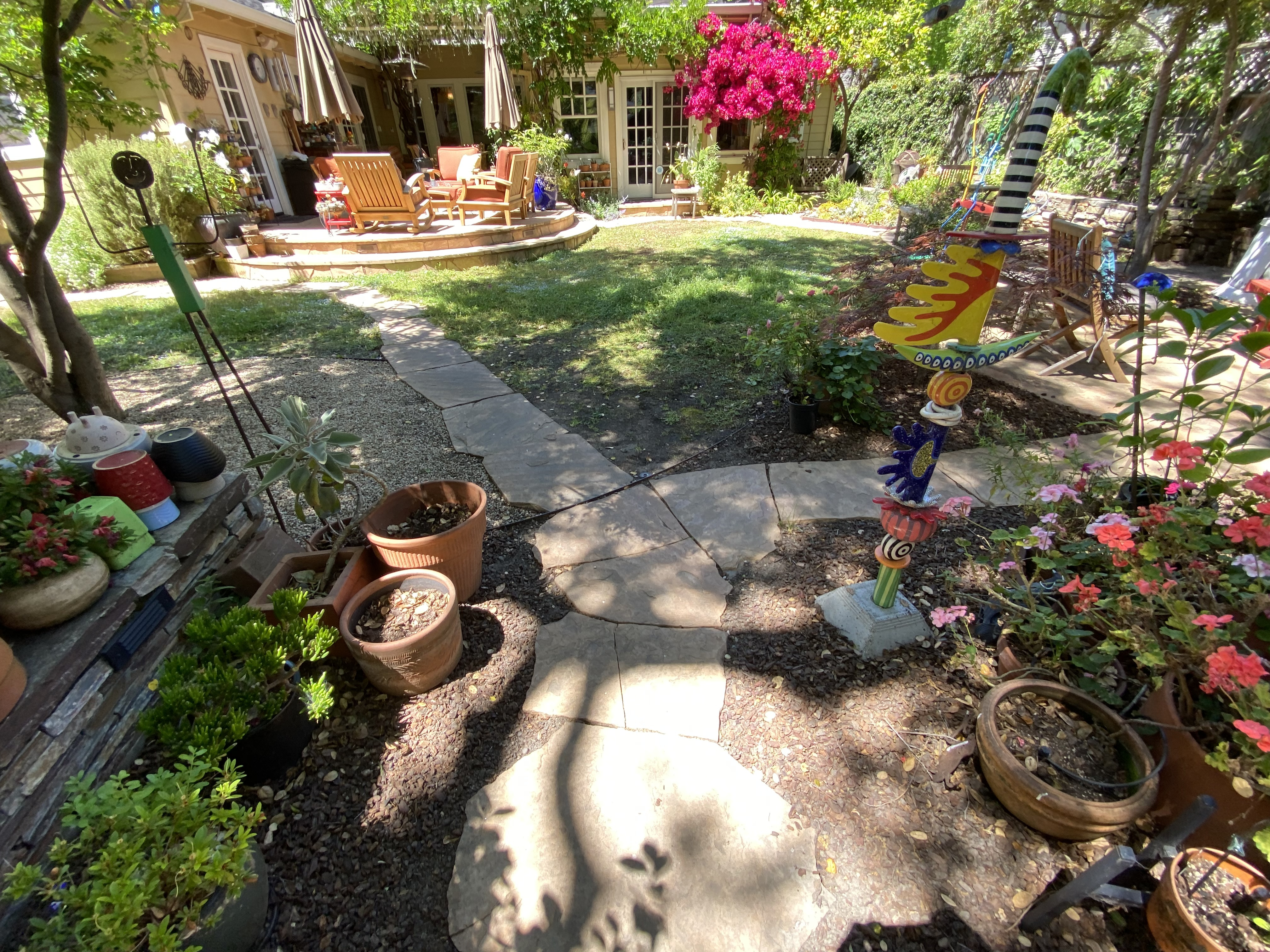 Before — Palo Alto flagstone patio section with algae and discoloration