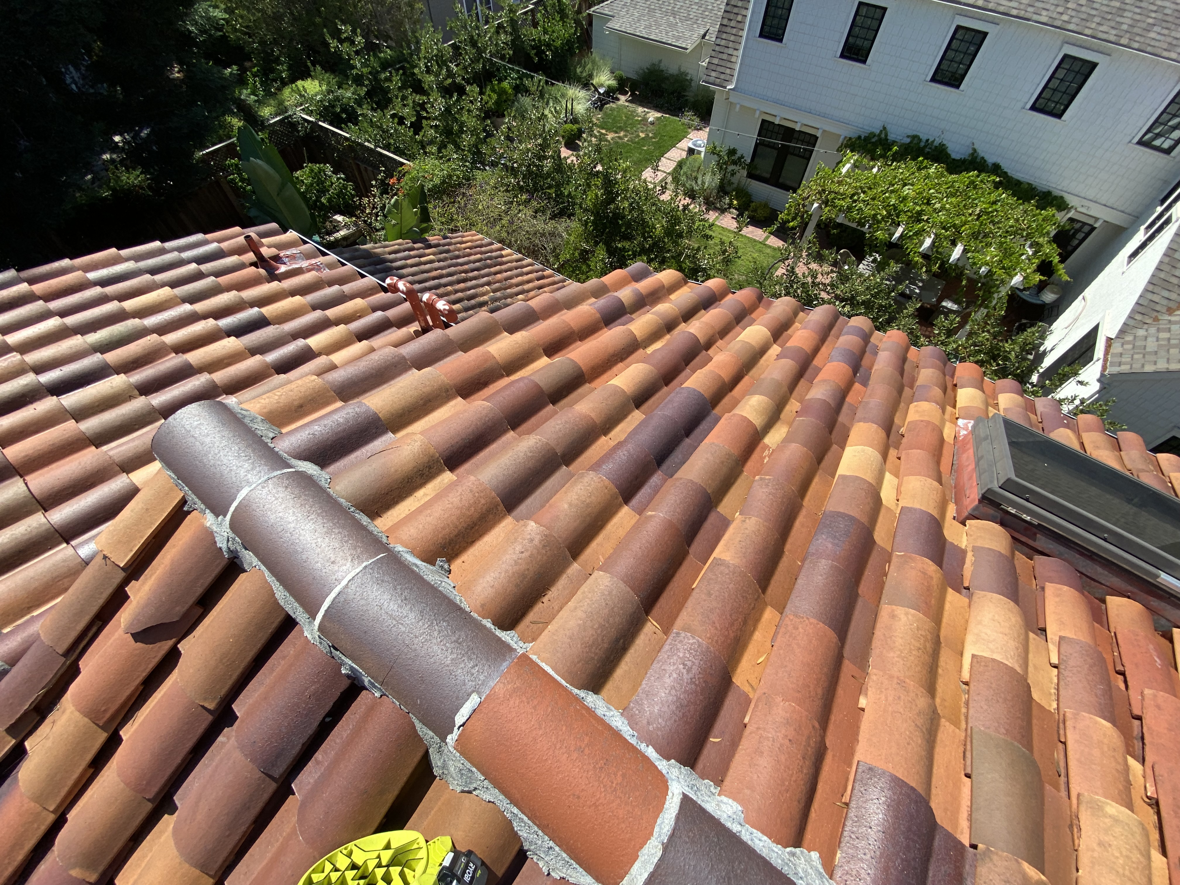 After — Palo Alto Spanish tile roof fully cleaned, no moss remaining