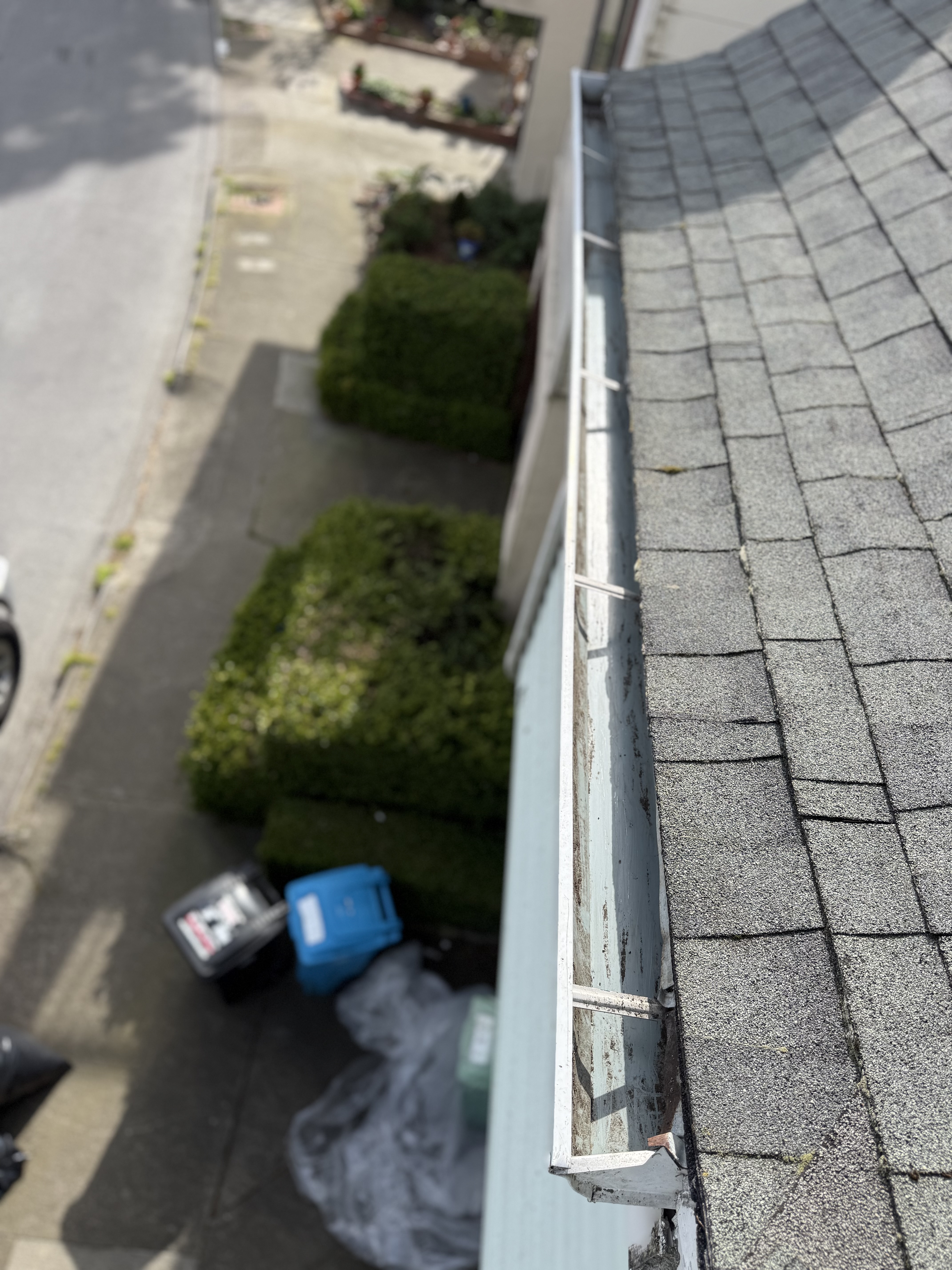 After — San Francisco gutter and downspout cleared, water flows freely