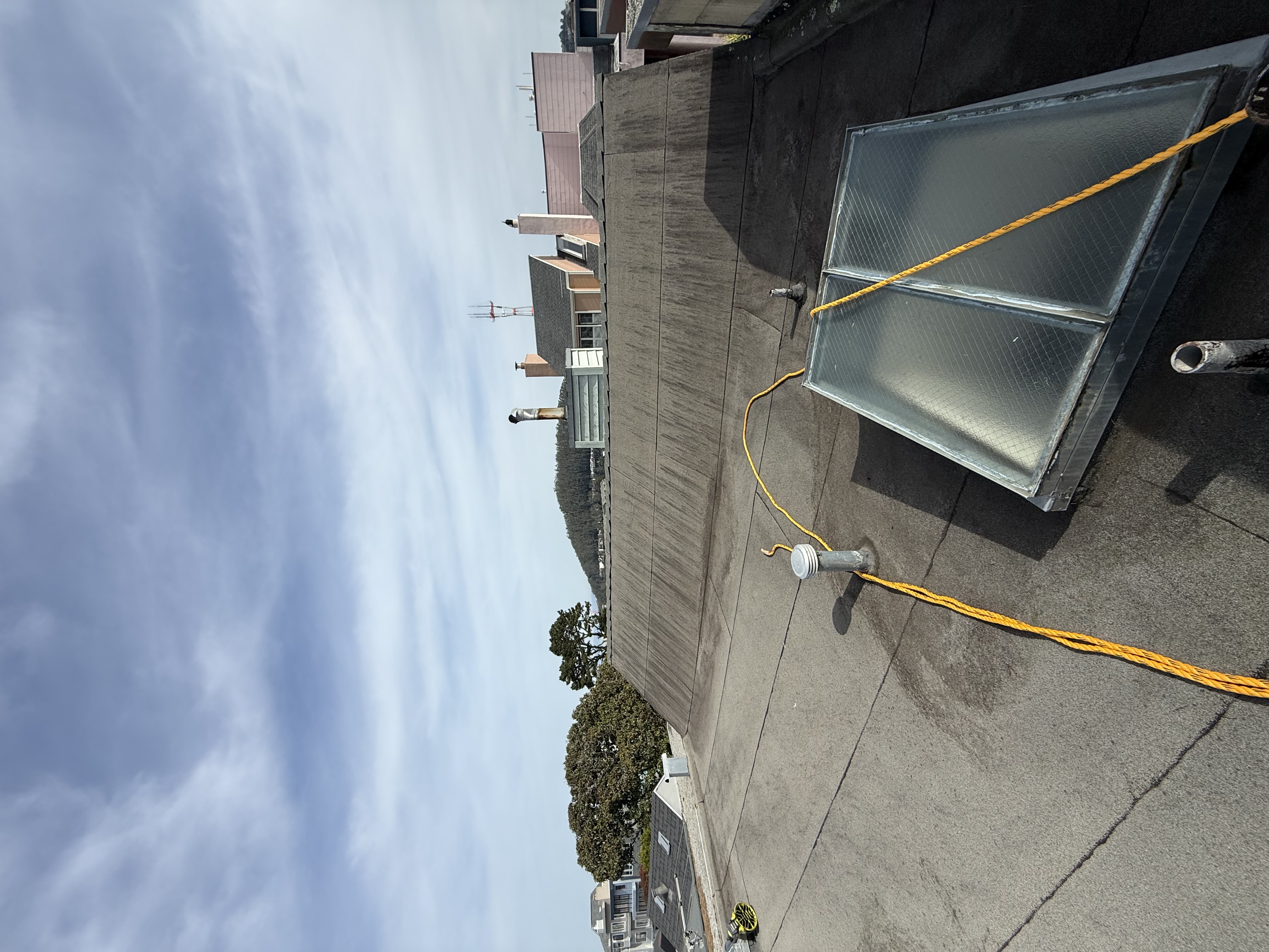 After — San Francisco roof cleaned, valleys and drainage clear
