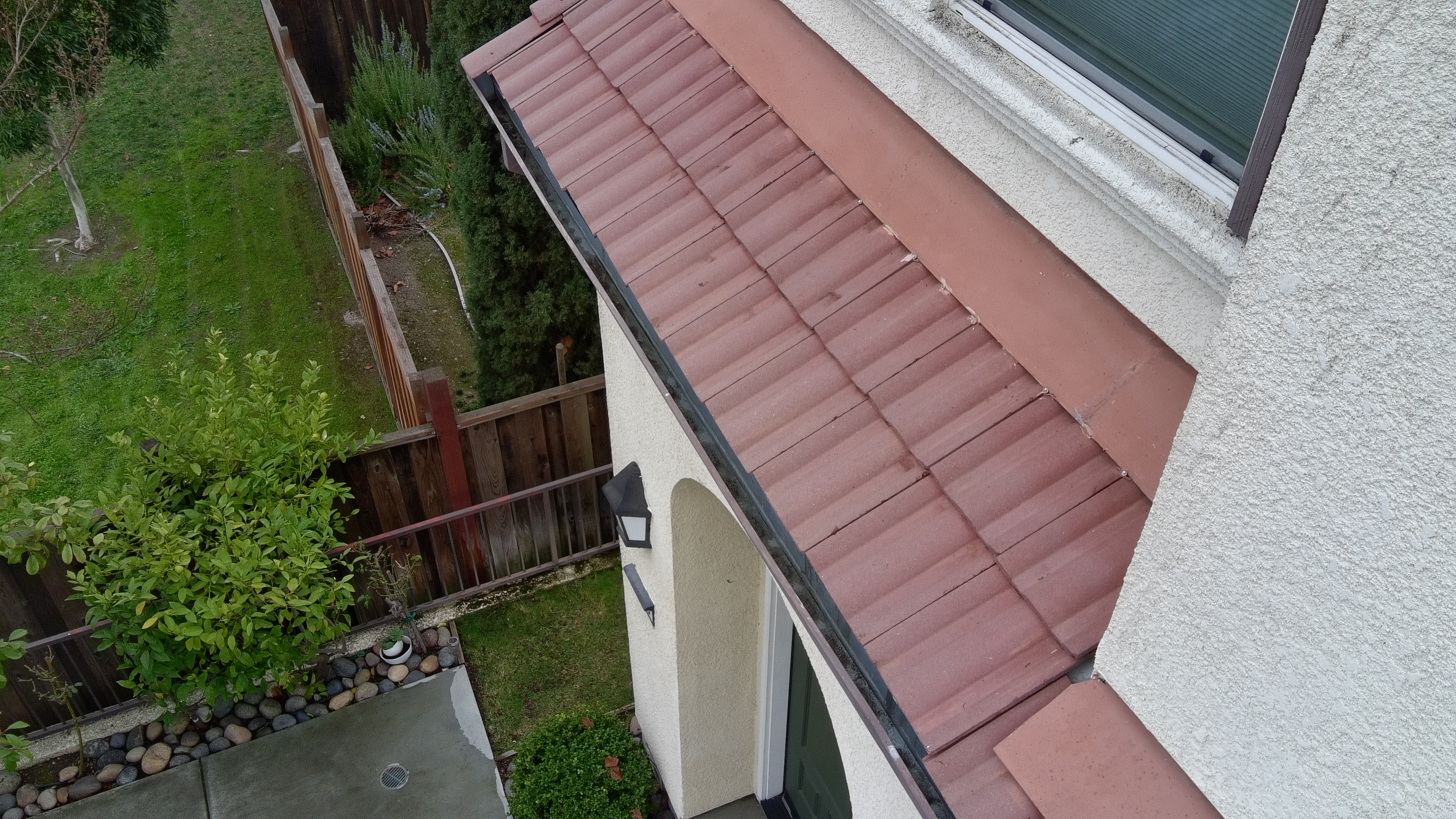 After — San Jose S-tile roof final result, ridge line clean, algae eliminated