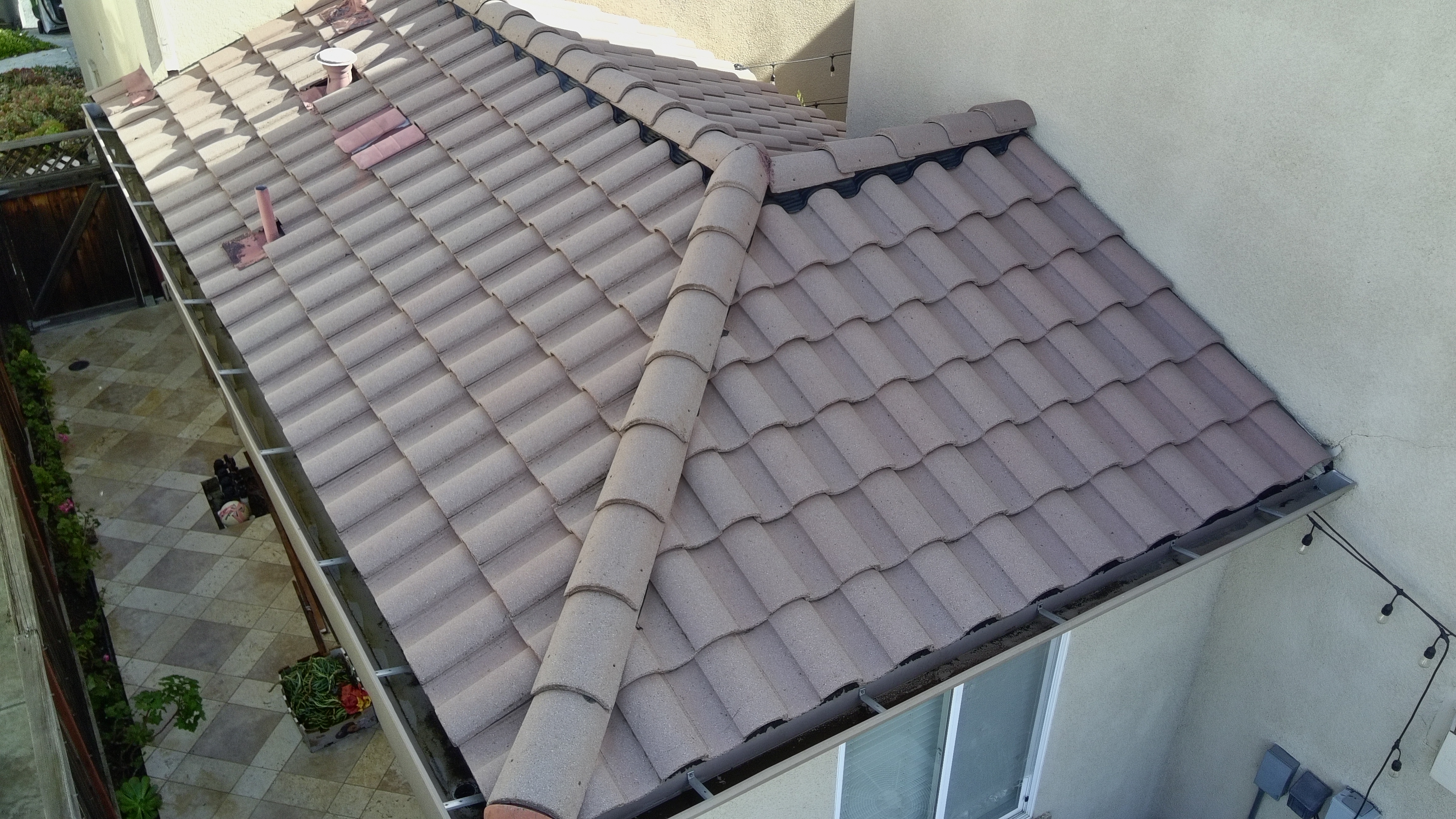 After — San Jose S-tile roof final result, ridge line clean, algae eliminated