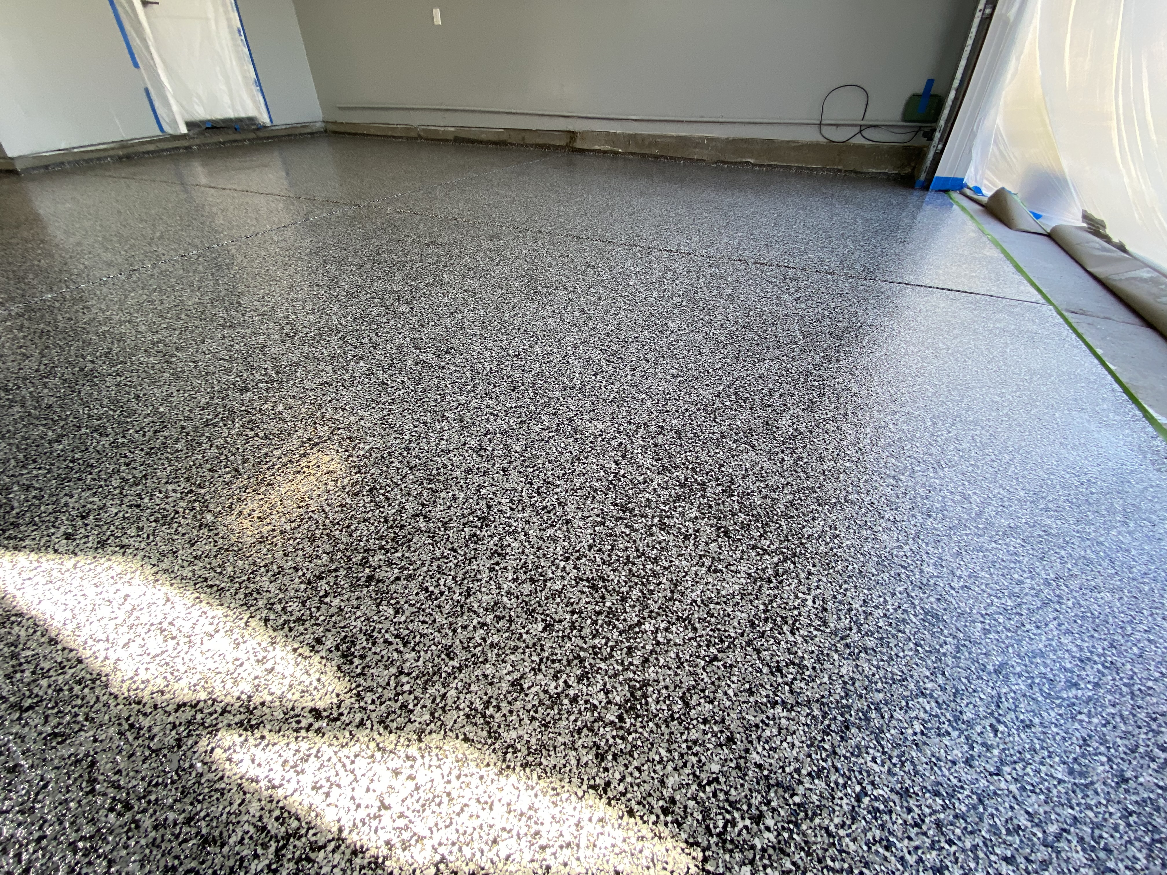 San Jose epoxy flake floor coating — garage edge detail
