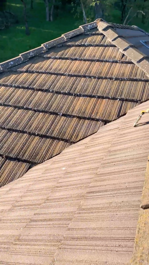 Soft washing a flat tile roof in San Jose, California