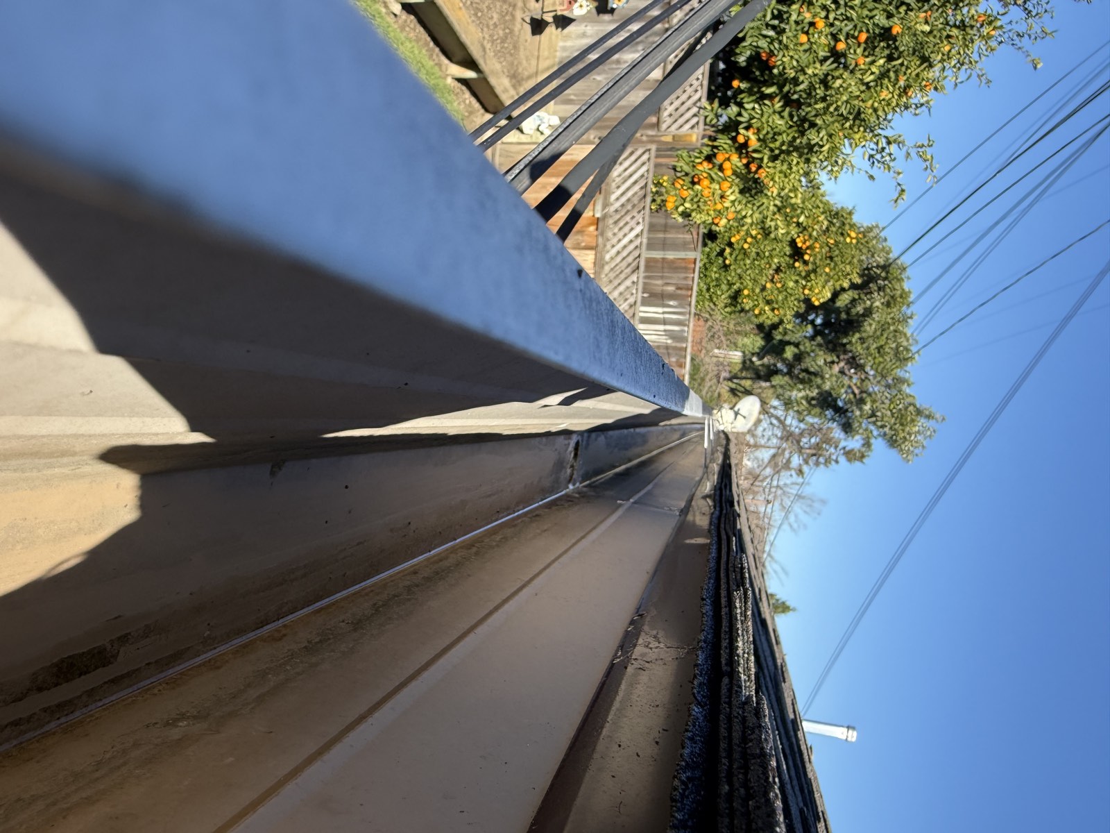 After — San Jose gutter and downspout inlet clear of debris