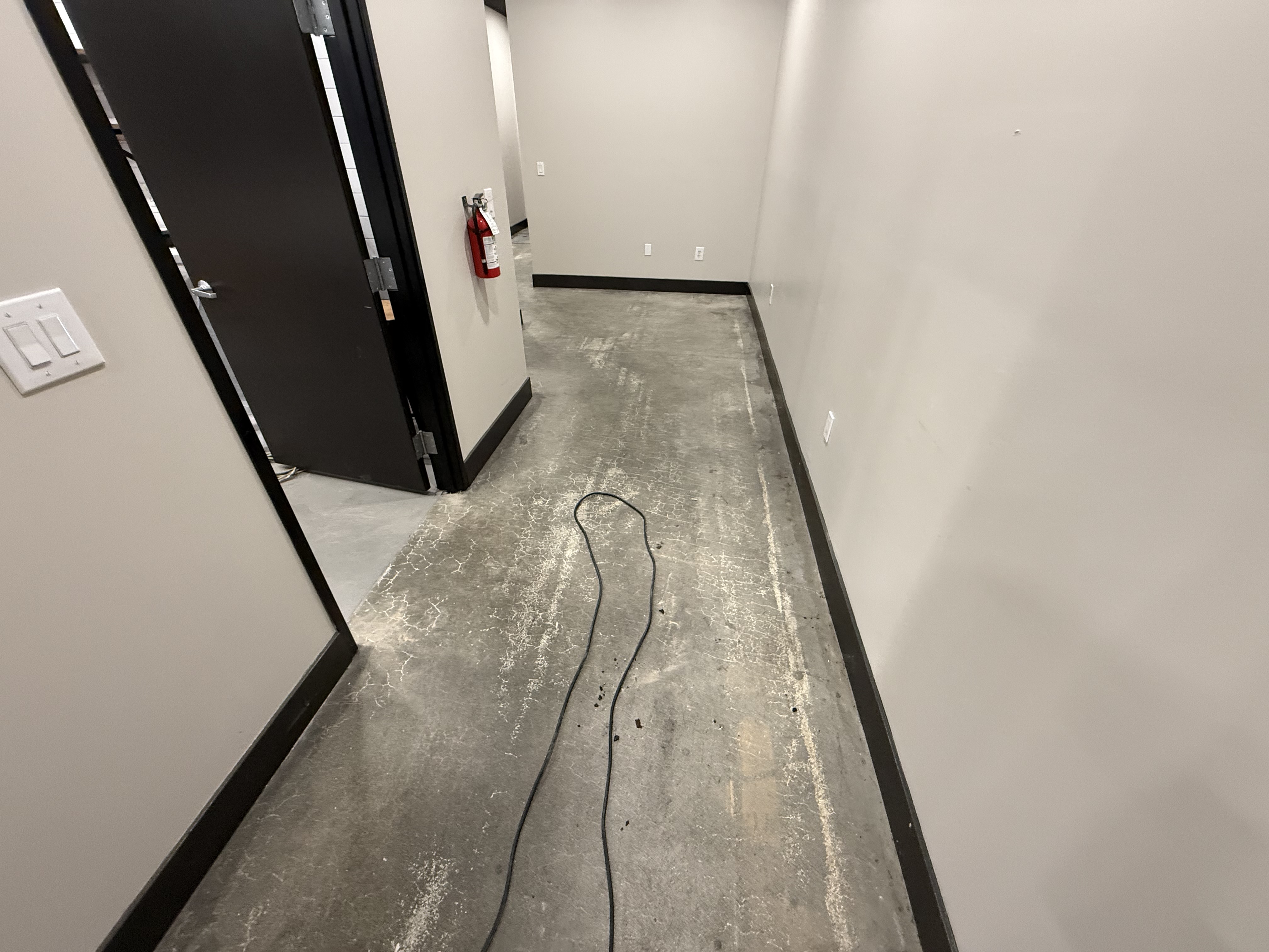 Before — San Jose garage floor before surface prep and epoxy coating