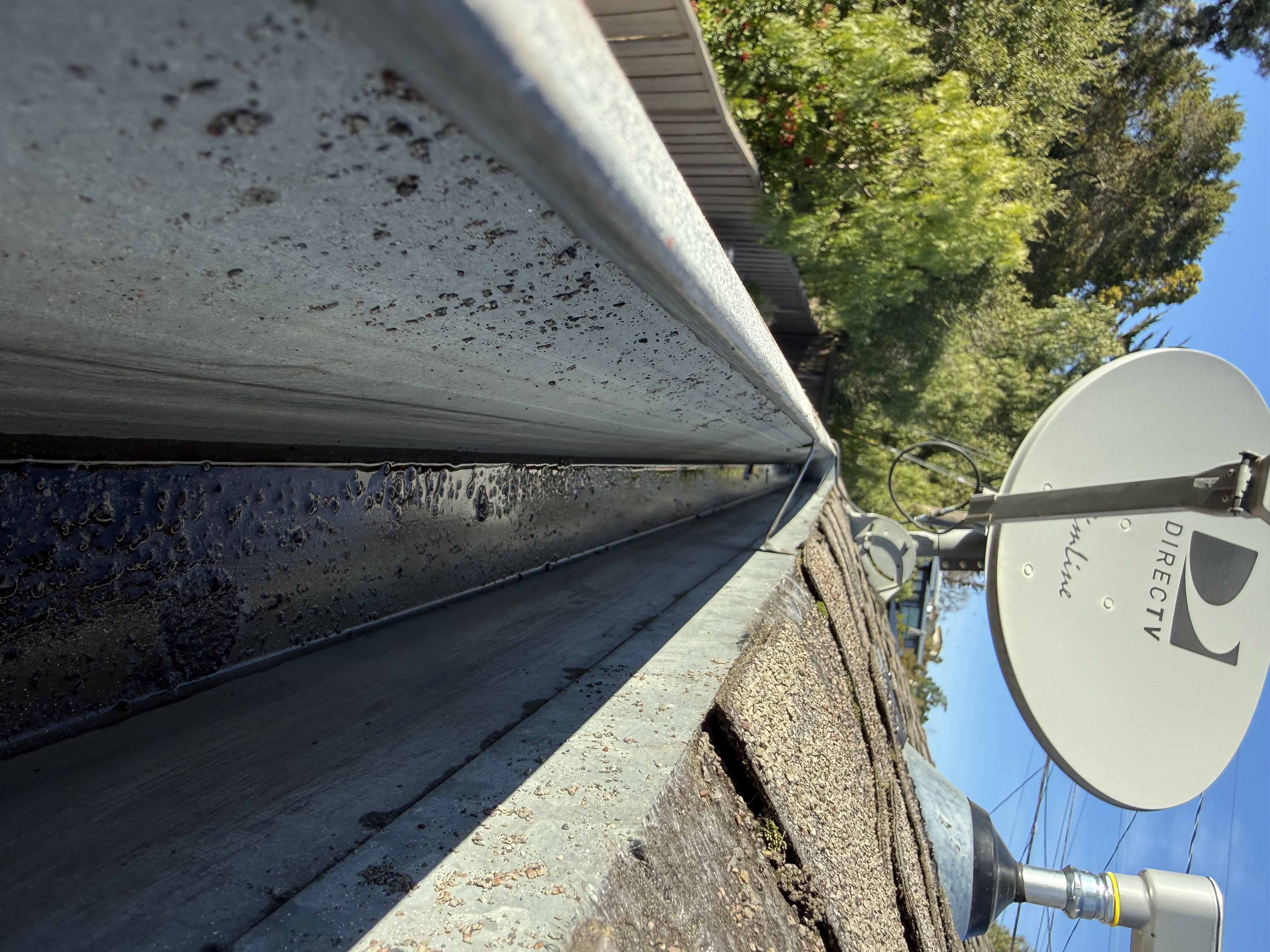 After — San Mateo gutter clean, flow confirmed from end to downspout