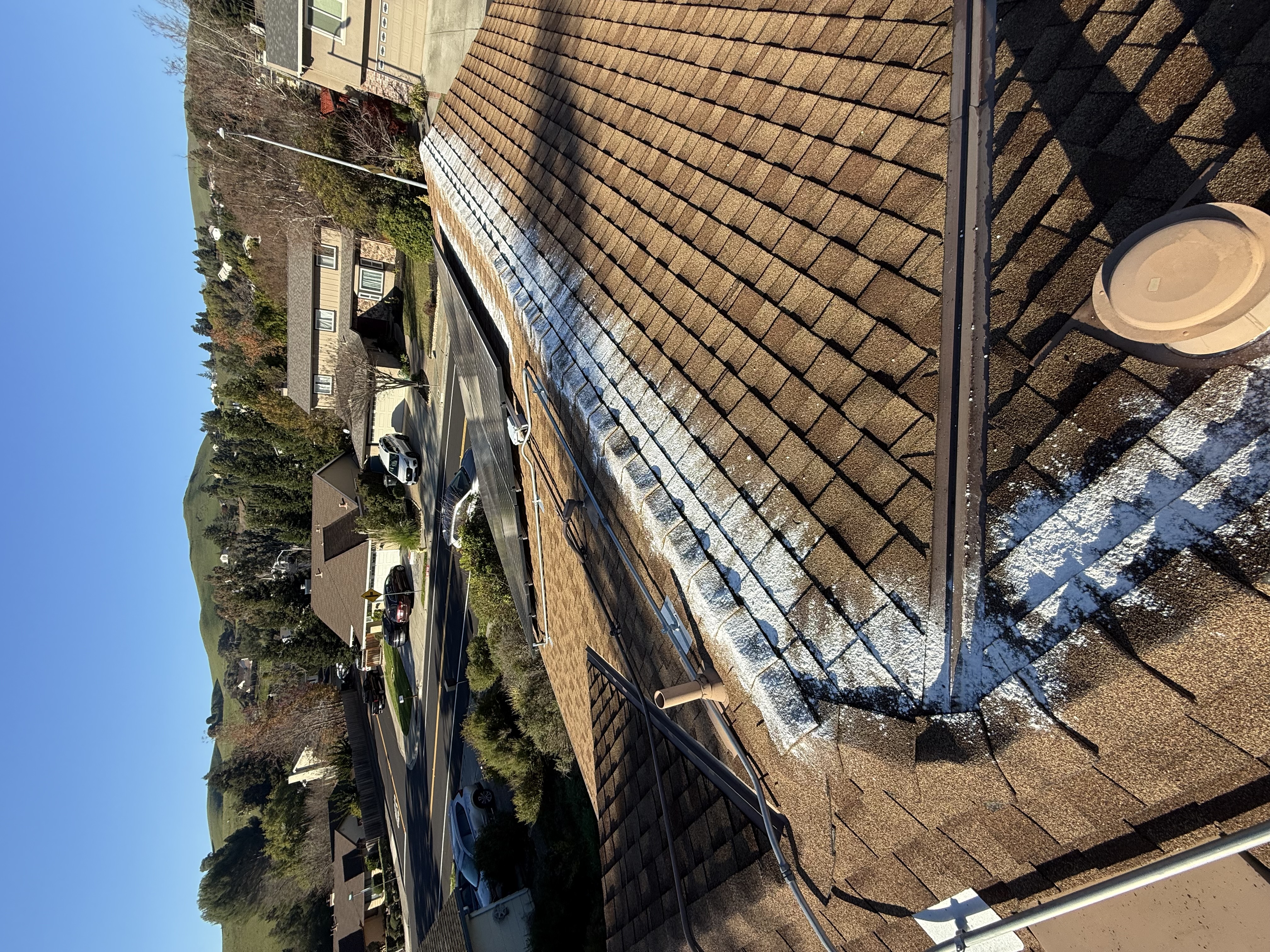 After — San Ramon asphalt shingle roof after zinc treatment installed at ridgeline