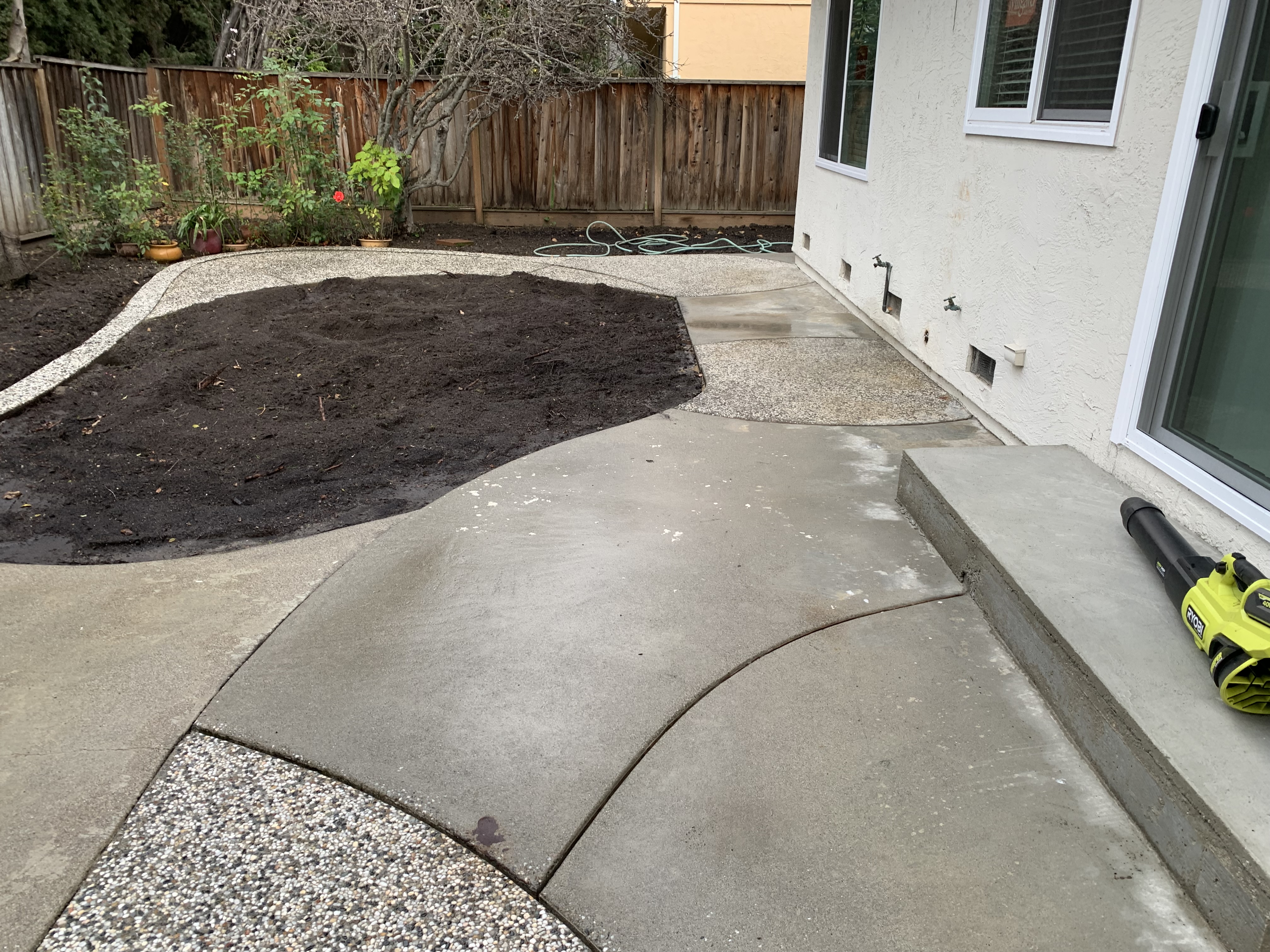 After — Sunnyvale backyard slab surface restored after pressure wash
