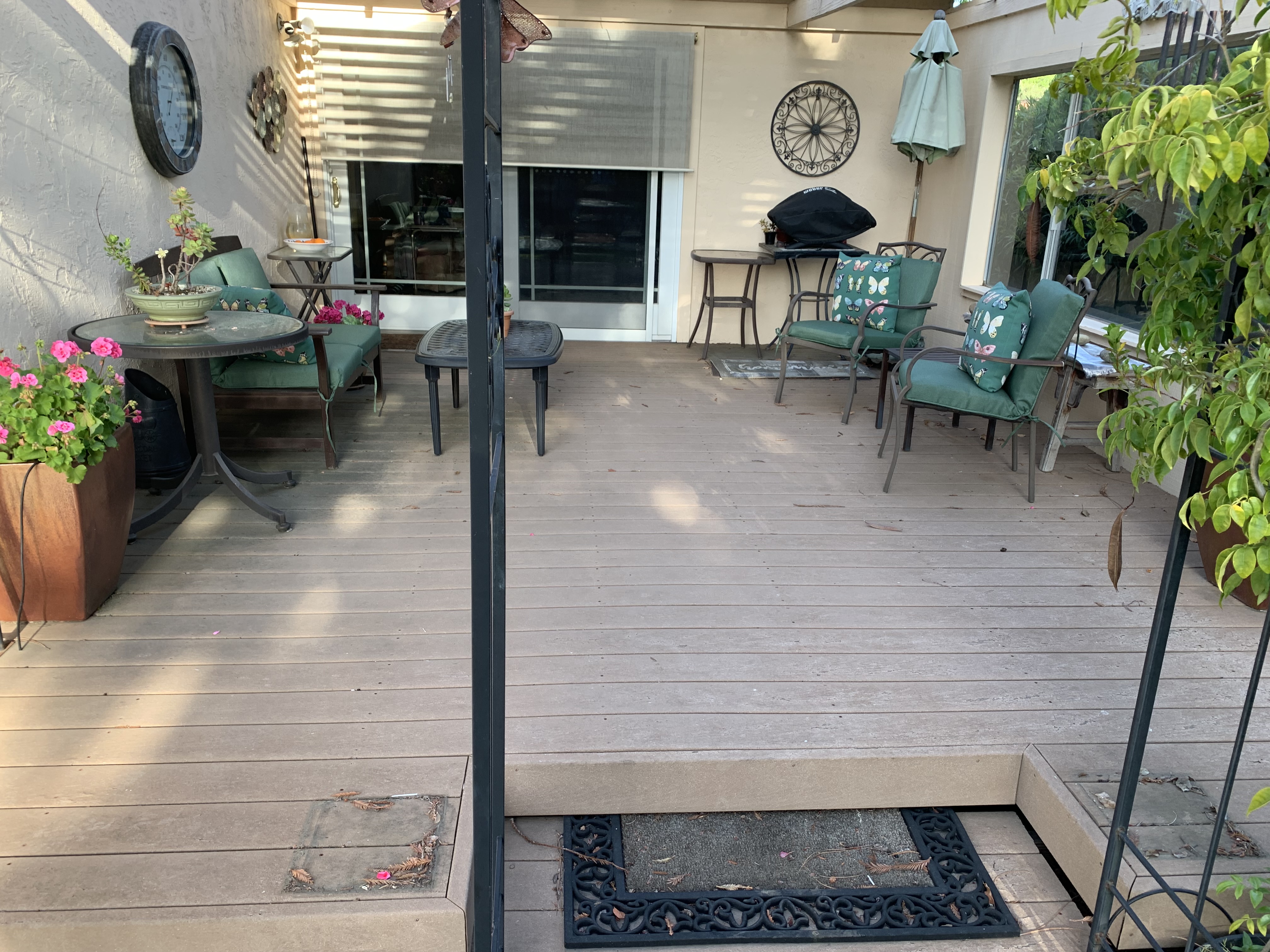 Before — Sunnyvale composite deck with algae and dark staining before cleaning