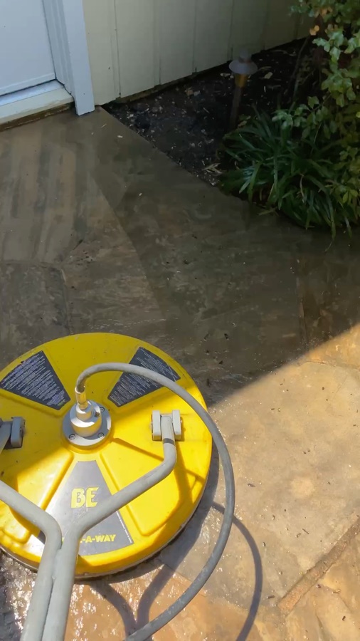 Surface cleaning a concrete driveway and flagstone walkway in Sunnyvale, California